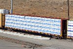 Duluth Winipeg & Pacific centerbeam flat DWC #627057 w Tolko wrapped lumber load.